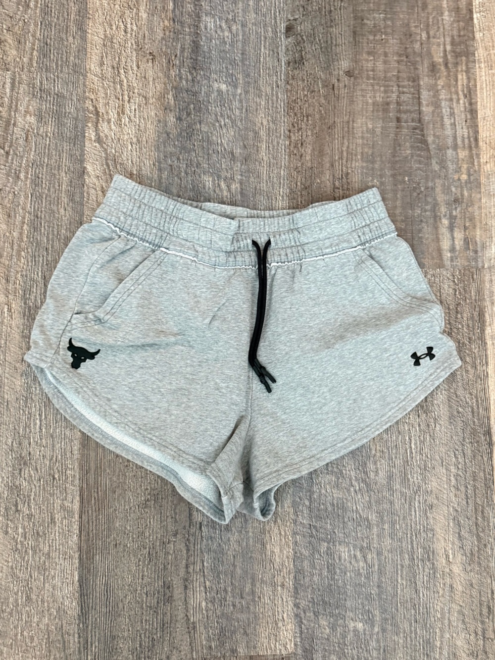 Under Armour Women's Light Gray Athletic Shorts with Black Drawstring